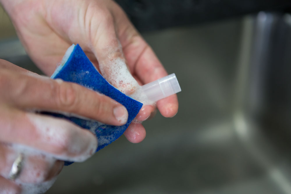 Cleaning the lip balm tube with soap